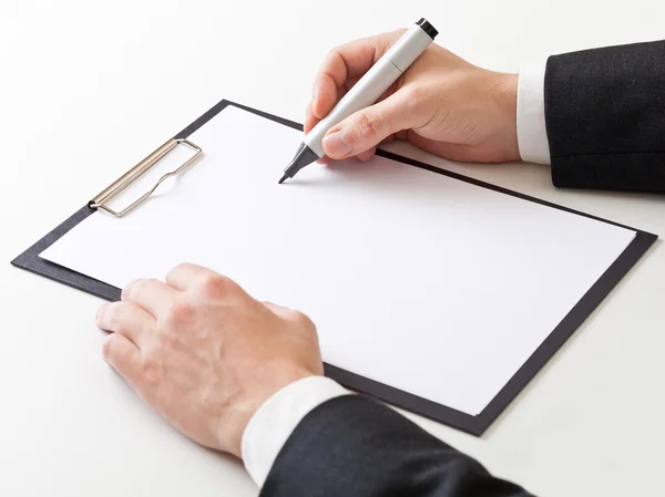 Businessman taking notes — Stock Photo, Image