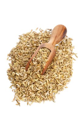 tahta kaşık ile rezene tohumu yığın