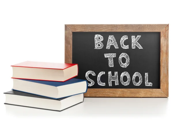 Back to school chalkboard  with books — Stock Photo, Image