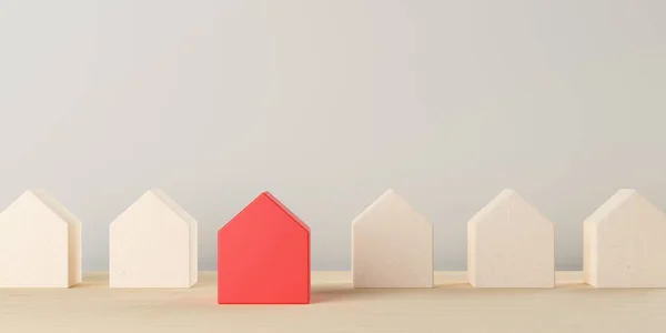 Row Small Wooden Houses Table Background One Red Standing Out — Stock Photo, Image