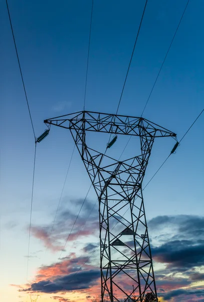 Hig voltage at sunset — Stock Photo, Image