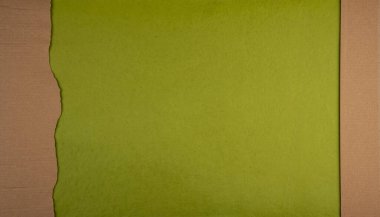 El yapımı kağıt arka planda karton yırtılması