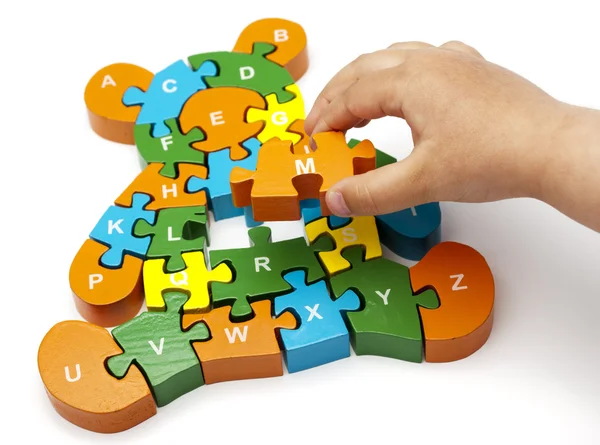 Wooden puzzle bear — Stock Photo, Image