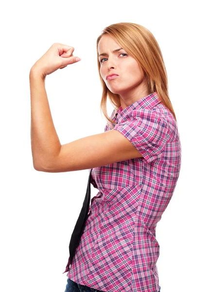Jovem menina casual mostrando seu bíceps — Fotografia de Stock