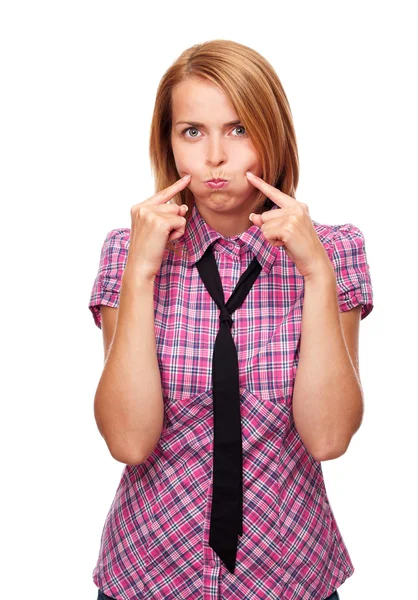 Young casual girl inflates her cheeks — Stock Photo, Image