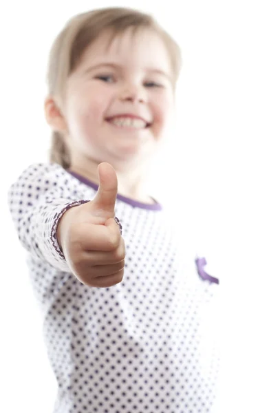 Bambina mostrando pollice in su — Foto Stock