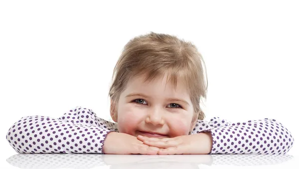 Niña está sentada — Foto de Stock