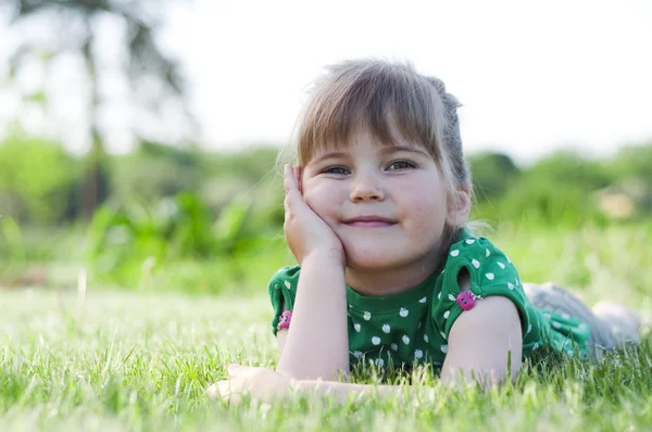 Little adorable girl in the park — Stock Photo, Image