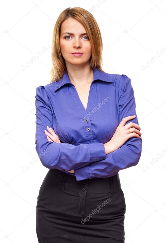 Serious business woman standing in studio