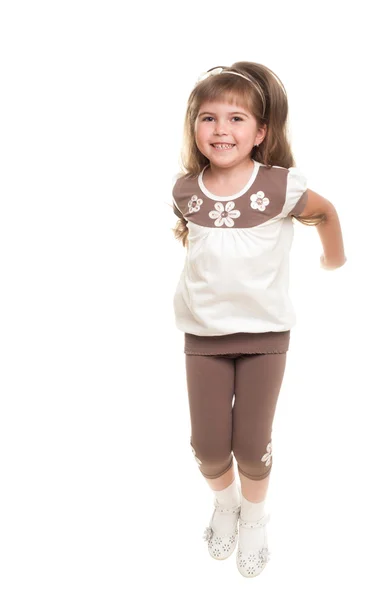 Cute little girl jumping in the studio — Stock Photo, Image