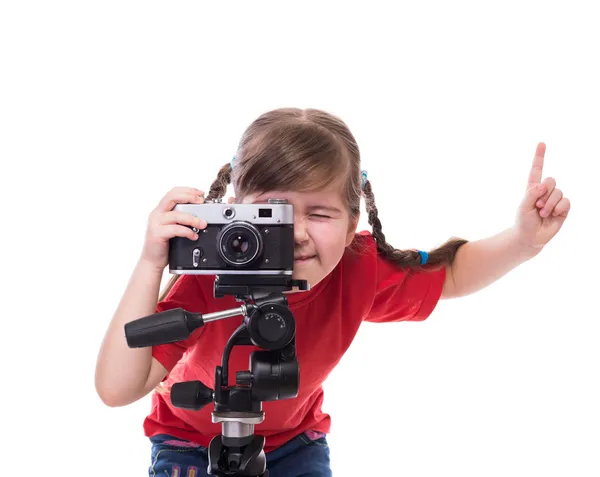 Piccolo fotografo con fotocamera vecchio stile Fotografia Stock