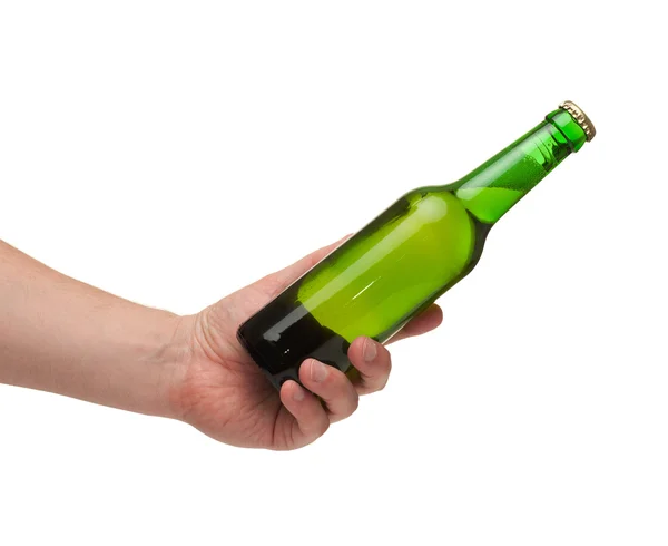 Mano sosteniendo una botella transparente verde —  Fotos de Stock