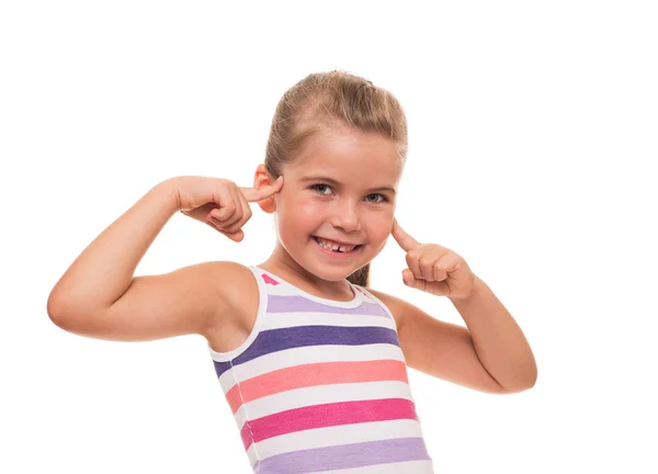 Lttle girl putting her fingers to her head on white background — Stock Photo, Image