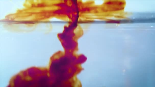 Dark brown coffee drink flows into water. Abstraction liquid filling water. — Stock Video