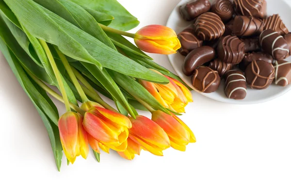 Tulips and Chocolate Candies — Stock Photo, Image