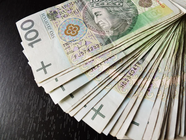 Tack of 100's polish zloty Stock Photo