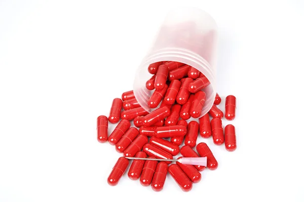 Red capsules, vitamin — Stock Photo, Image