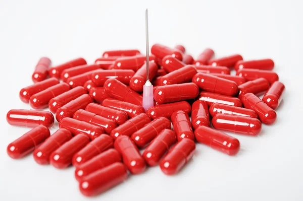 Red capsules, vitamin — Stock Photo, Image