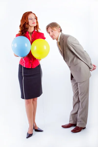 Business man and woman with air balloons — Stock Photo, Image