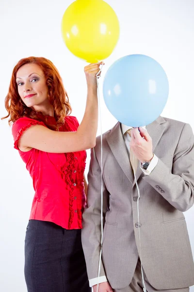 Business man and woman with air balloons — Stock Photo, Image