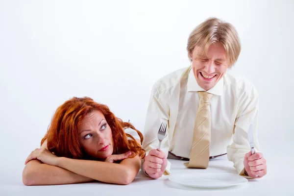 Women and man with blank plate — Stock Photo, Image