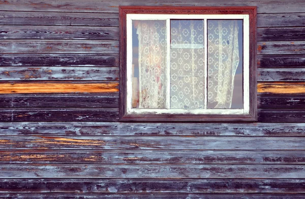 Wall of the old wooden house with window — Stock Photo, Image