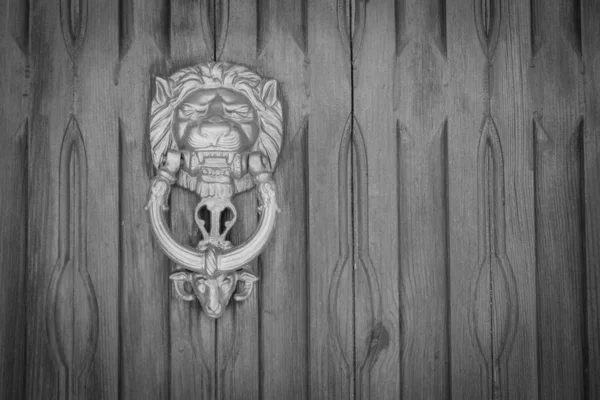 Black White Photo Wooden Door Knocker Form Lion Abstract Background — стоковое фото