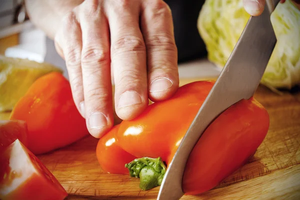 Cutting vegetables for a meal Stock Picture