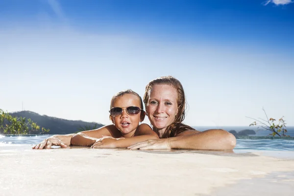 Mother and son in a swimming pool Royalty Free Stock Photos