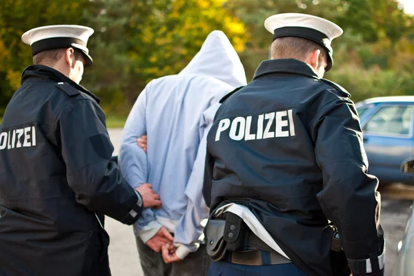 Police officers arrest man — Stock Photo, Image