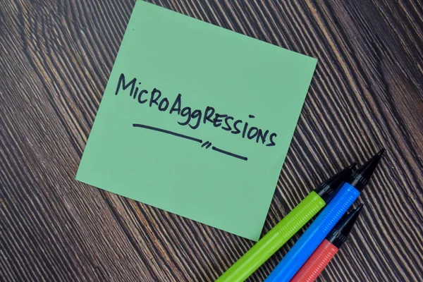 Microaggressions Write Sticky Notes Isolated Wooden Table — Foto Stock