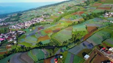 Aerial view of the Nepal van java is a Rural tour on the slopes of mount sumbing, The beauty of building houses in the countryside of the mountainside. Magelang, Indonesia, January 9, 2022