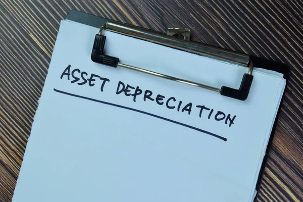 Asset Depreciation Write Paperwork Isolated Wooden Table — стоковое фото