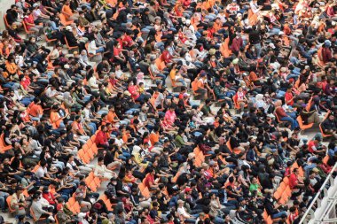 Crowds on Group of fans on the stadium Jakarta International Stadium. Jakarta, Indonesia, August 1, 2022