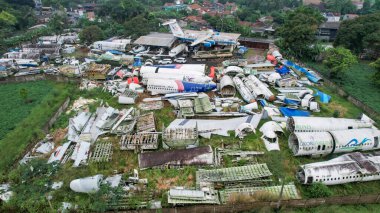 The wreckage of a tourist plane, in Parung, Bogor. The metal remains of the hull and wings of the ship can be seen, like a carcass. Bogor, Indonesia, August 23, 2022