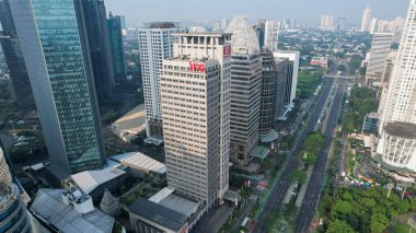 Aerial view of the new green urban landscape in the city. With noise cloud. Jakarta, Indonesia, Juni 23, 2022