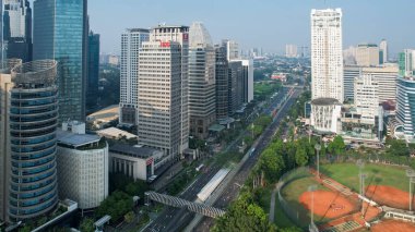 Aerial view of the new green urban landscape in the city. With noise cloud. Jakarta, Indonesia, Juni 23, 2022