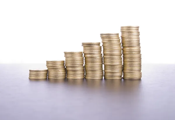 Stack of coins on white background — Stock Photo, Image