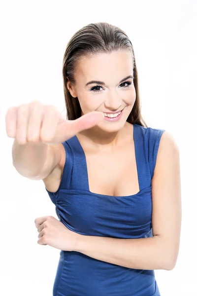 Hermosa chica muestra un signo sobre un fondo blanco — Foto de Stock