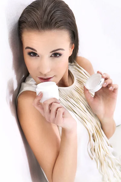 Portrait of beautiful woman with cream — Stock Photo, Image
