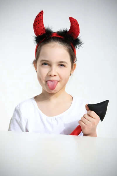 Portrait of little girl dressed as pretty imp — Stock Photo, Image