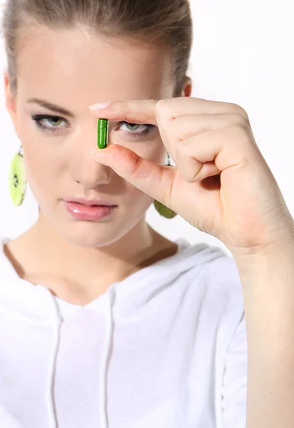 Flickan med tabletten på en vit bakgrund — Stockfoto