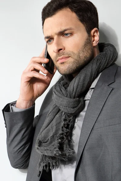 Young businessman using cell phone — Stock Photo, Image