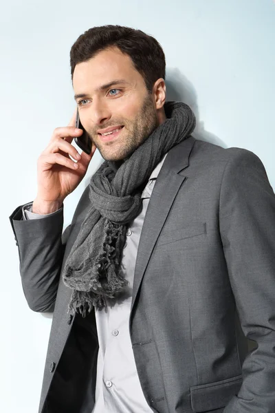 Young businessman using cell phone — Stock Photo, Image