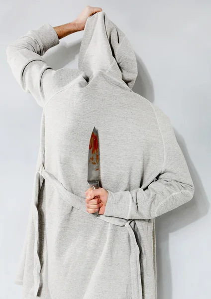 Man with a bloody knife — Stock Photo, Image