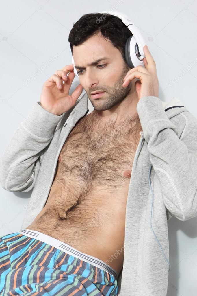 Stylish man listening to music