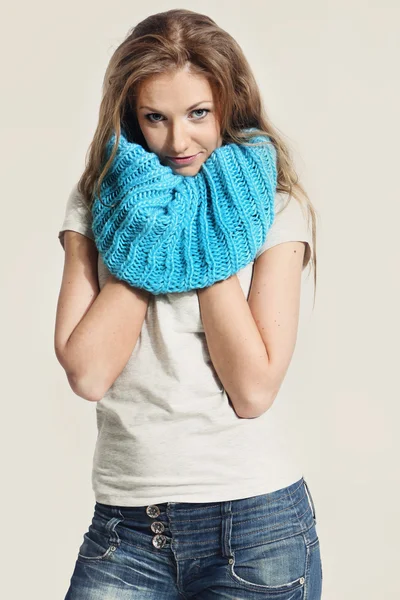 Beautiful girl in a blue scarf — Stock Photo, Image