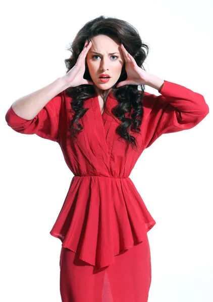 Beautiful girl in a red dress — Stock Photo, Image