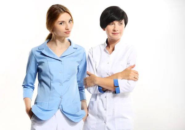 Portrait of two successful female doctors standing — Stock Photo, Image