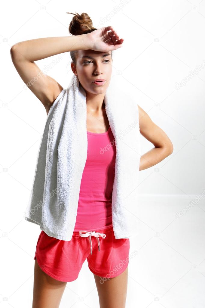 Tired woman after workout wipes